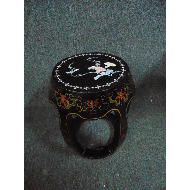 Vintage black lacquer Chinoiserie stool or plant stand with shell inlay design.