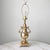 A vintage brass Samovar vessel table lamp with lampshade hanger and finial.