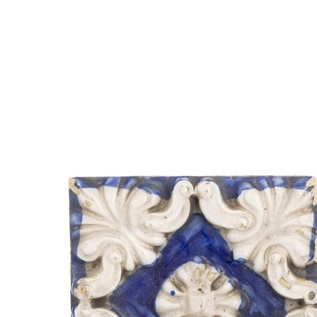 Earthenware - Two tiles - 19th century. Portuguese; possibly manufactured in the North in the 19th century; in shades of...
