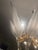 Up for sale is a vintage Franco Luce chandelier featuring 8 elegant white, translucent leaves. This classic Italian piece...
