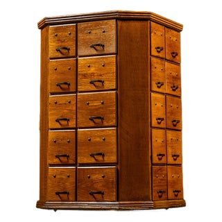 Early 20th Century Rotating Hardware Cabinet With Pull Drawers For Sale