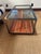Stylish and very functional custom made industrial coffee table on casters having metal frame, chicken wire top and...