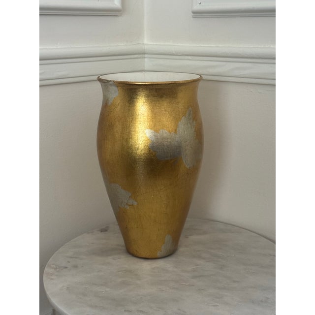 Vintage Italian gold and silver leaf finished terracotta Florentine style vase. With beautiful silver leaf images hand...