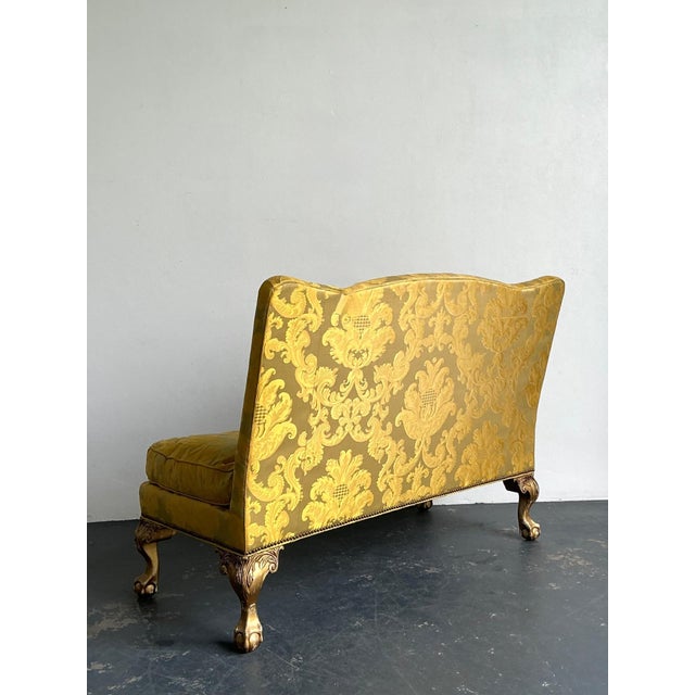 This exquisite banquette sofa from the Lillian August Collection is a masterclass in Neoclassical luxury and refined...