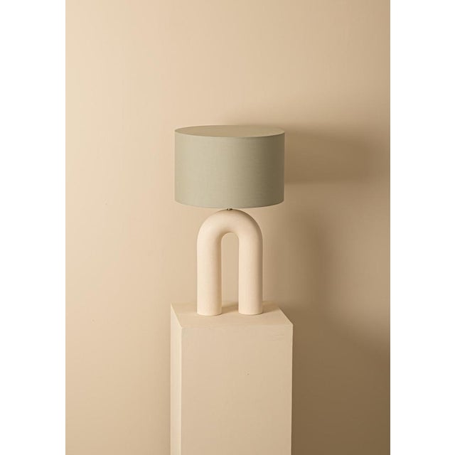 Ecru ceramic arko table lamp with grey olive lampshade by simone & marcel dimensions: ø 40 x h 67 cm. Materials: cotton...