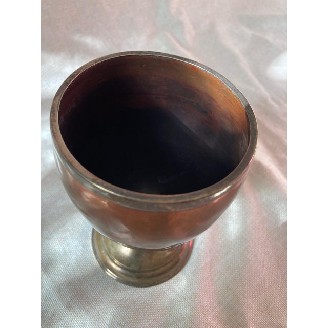 An unusual and historically fascinating antique heavy English copper and silver-mounted goblet associated with two of...