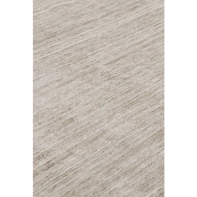 Handmade in art silk, this 15x24 rug is a rich new addition to Rug & Kilim’s Textural rug collection—with an impressive...