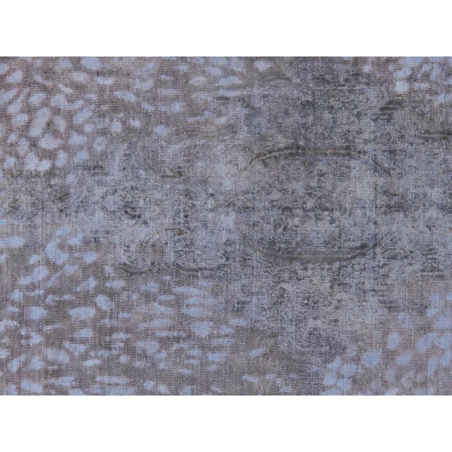 Looking for a rug that makes a statement? Look no further than this gorgeous vintage overdyed rugs. Now Pasargad's best...