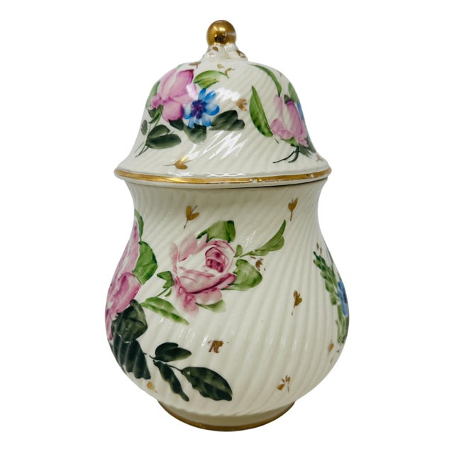 Elevate your decor with this beautiful vintage ceramic ginger jar. This lidded pot features a stunning hand-painted floral...