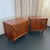 This wonderful pair of Mid-Century Modern walnut nighstands are American made circa the 1960s. The pair feature cube...