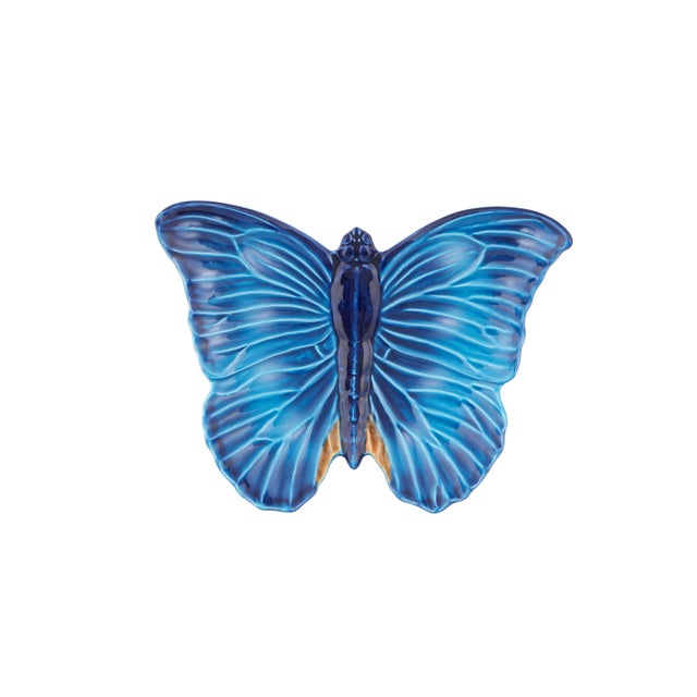 A world reference in fashion, Claudia Schiffer has allied her appreciation of the English countryside with butterflies in...