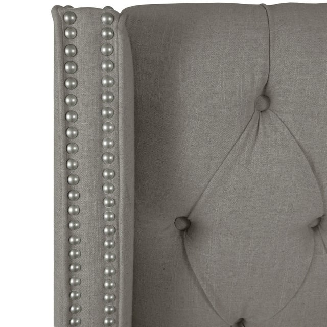 This Upholstered Bed brings hotel luxury to your bedroom. Crafted by hand, the headboard is designed with deep button-...