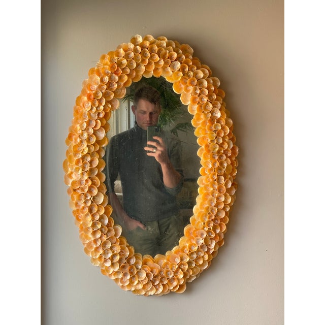Antique Oval Wall Mirror With a Newly Handmade Frame with gold/ orange Jingle Shells
