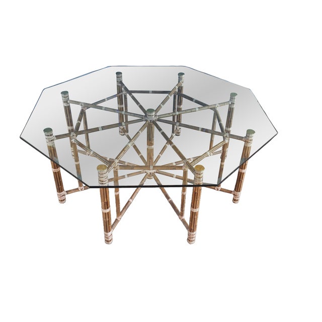 Monumental mid century modern dining table by McGuire Furniture. The table features octagonal form with a complex...