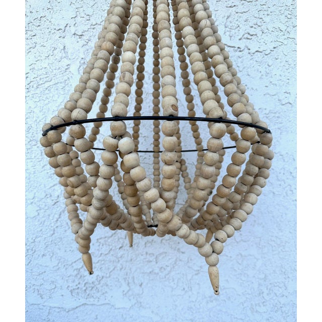 Coastal/Boho Natural wood beaded chandelier no light, but you can easily hang one inside. Perfect for decoration. 30in h x...
