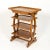 A small-scale French fruitwood étagère with four tiers and a single narrow drawer under the top shelf. A raised three-...