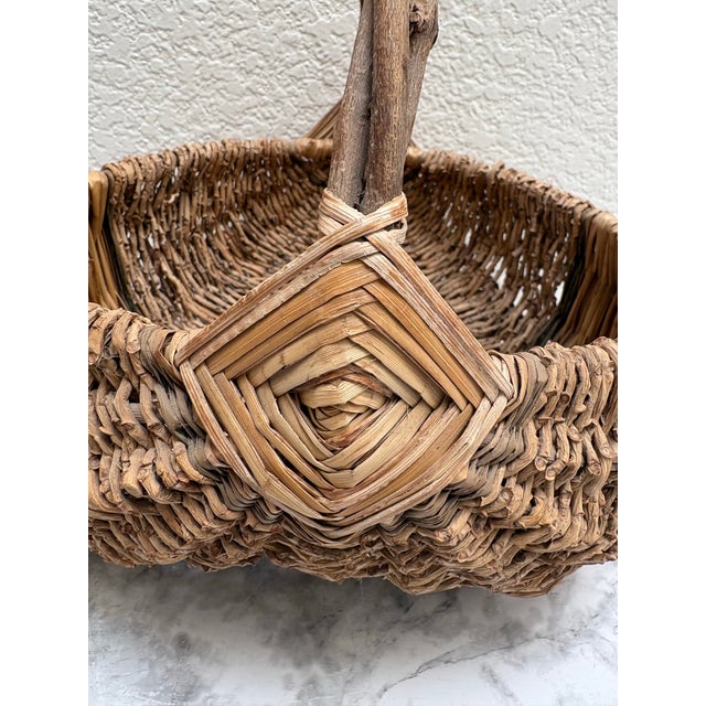 Vintage rustic twiggy decor and storage basket with bent stick handle and rustic design accents. Love this for guest...