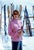 Zermatt Ski Fashion by Toni Frissell A colourful skier has her portrait taken at the bottom of the slopes in Zermatt,...