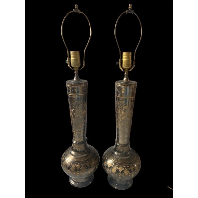 Set of 2 Mid-Century Brass Etched Ornate Indian Lamps Condition: great pre-owned. All works, cord in a good condition.