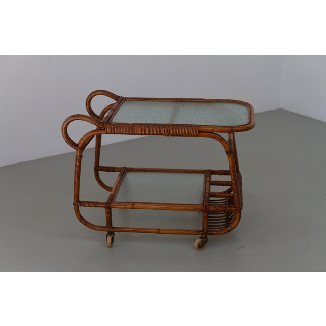 Danish Bamboo and Rattan Bar Cart by Elvin Geertsen, 1950s. Early Scandinavian Mid-Century Modern does also include...