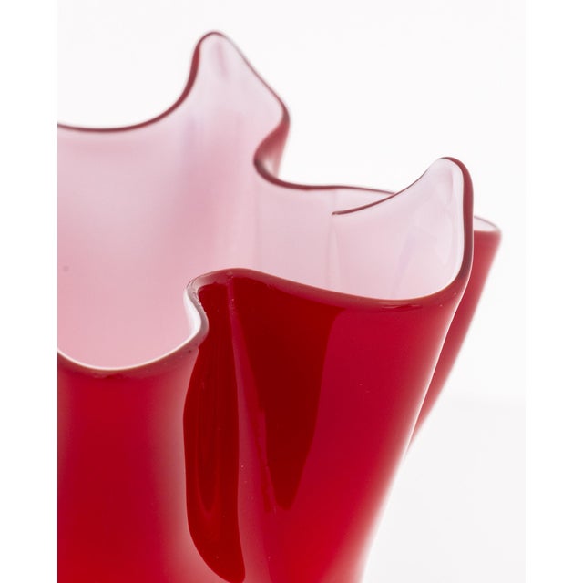 Illums Bolighus Red Glass Handkerchief Vase, with white glass interior and label to underside. 4.5" H x 5.25" W x 5" D....