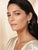 A sculptural pair of Bulgari Gancio earrings, crafted in highly polished 18-karat yellow gold. Each earring features two...