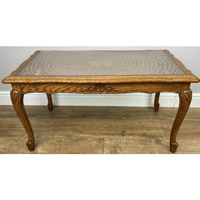 Bring timeless French elegance into your home with this Vintage French Coffee Table , crafted from oak and featuring an...