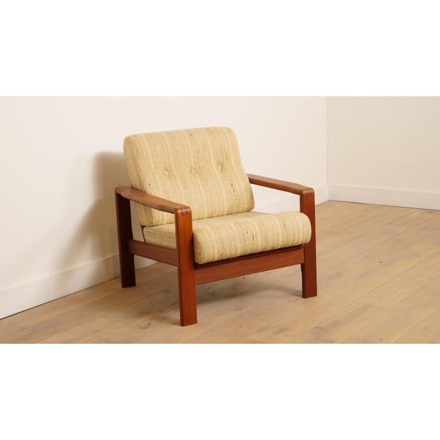 Vintage lounge armchair | Teak | Cream Beautiful vintage teak armchair, designed in the 1960s, in distinctive Danish...