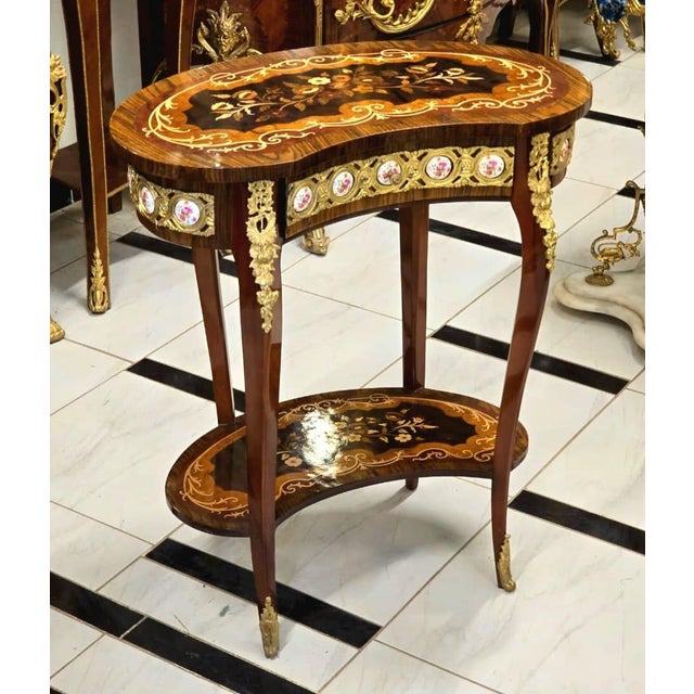 Delicate, graceful, and undeniably romantic, this stunning French Louis XV Side Table feels like a piece taken from an...