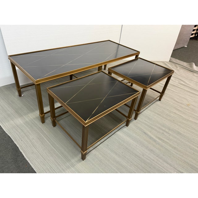 Design Plus Gallery presents a Three-Piece Italian Modern Nesting Coffee Table Set. This vintage set includes one...