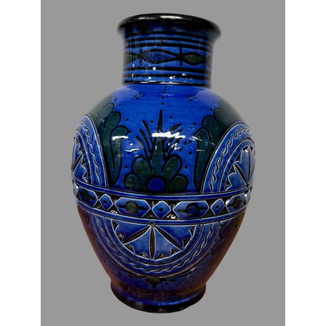 Vintage Incised Cobalt Blue Decorated 10" Art Pottery Vase An attractive vase with repeating floral & inscribed geometric...