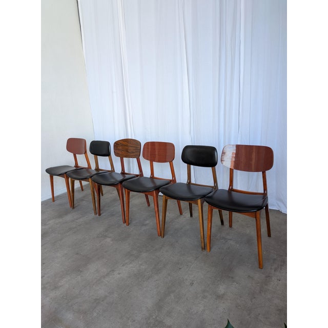 Vintage set of 6 dining chairs manufactured by STOL Kamnik in Yugoslavia during the 1970s. This mix & match set features...
