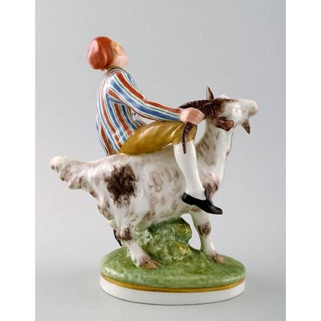 Royal Copenhagen, Julian Marie's mark. Porcelain figurine decorated in overglaze, 'Clumsy Hans' No. 1228. After fairytale...