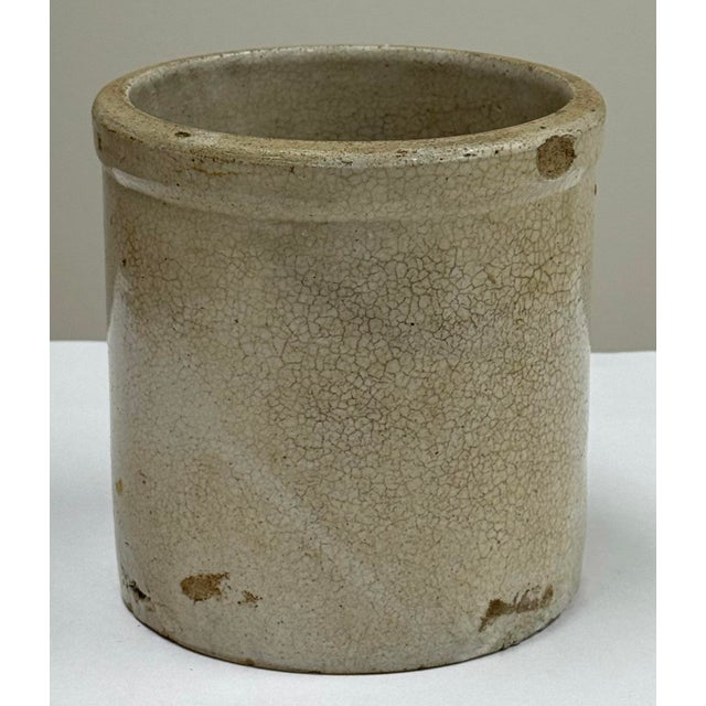 Antique glazed crock vessel with wonderful patina. Crazing throughout. Ideal for plants, kitchen utensils, garden tools,...