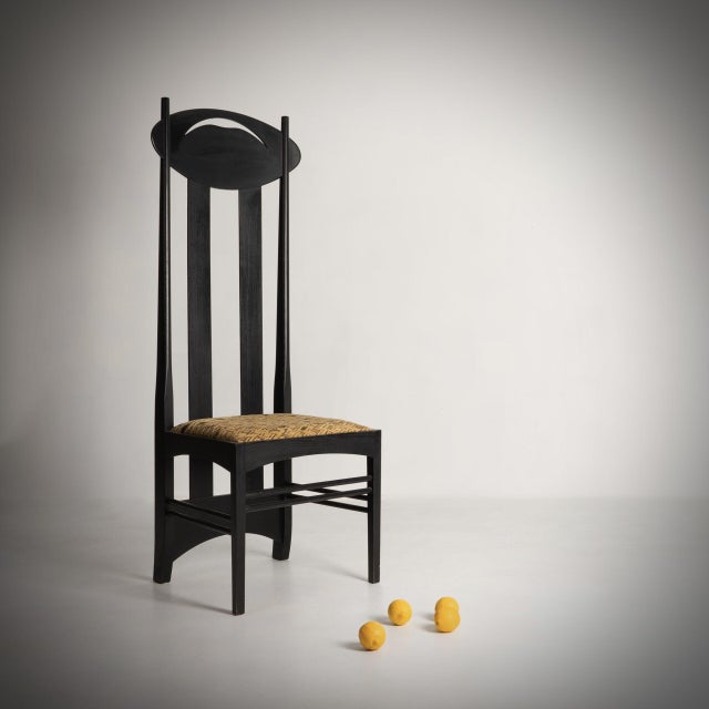 CHARLES RENNIE MACKINTOSH (1868-1928) Argyle chair Cassina publisher, circa 1970 after a design from 1898 Blackened oak...