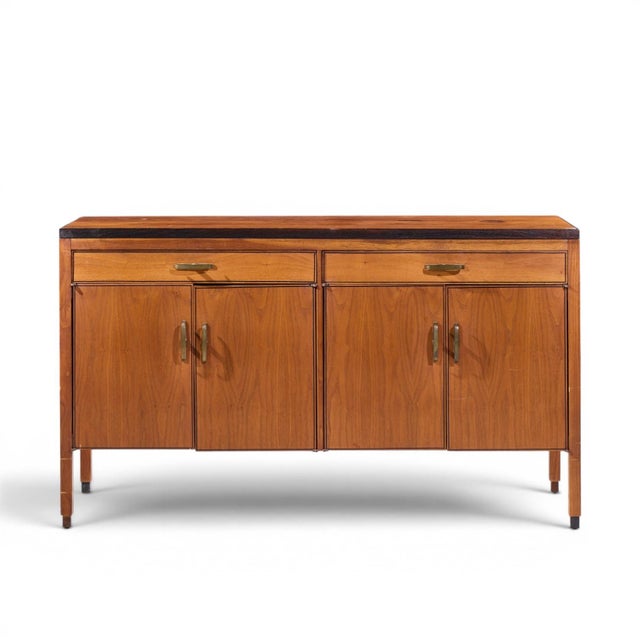 Kipp Stewart for Calvin Mid Century Ebonized Teak Credenza This credenza measures: 54 wide x 18 deep x 31.25 inches high...