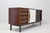 Sideboard designed by Charlotte Perriand, circa 1960. Produced by Steph Simon (France). Steel base, wooden frame and...