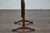 A French Louis-Philippe walnut wine tasting table from circa 1820-1850 with tilt top and paw feet. Elevate your space with...