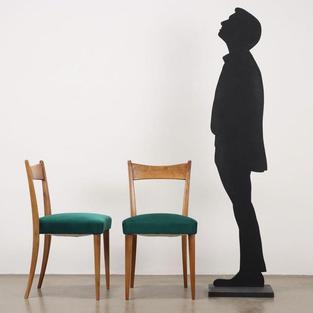 Set of four vintage Italian-made dining chairs with beech wood structure, seat with spring padding and emerald green...