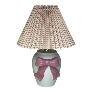 1970s Vintage Ceramic Table Lamp With Pink Bow and Pleated Window Pane Shade For Sale