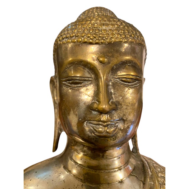 This is a beautiful 6.75" Buddha bust made of brass or bronze, silvered in Nepal or Tibet. The detailed craftsmanship and...