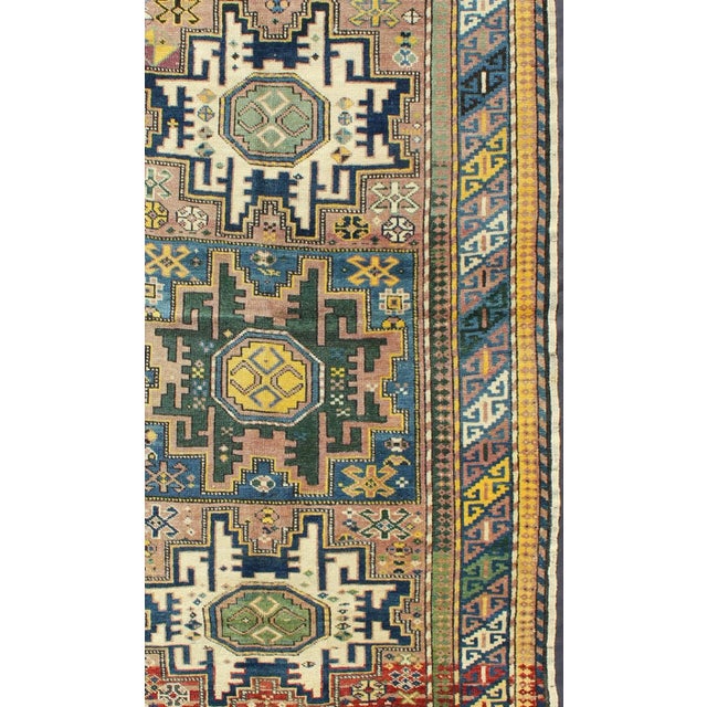 Tribal Late 19th Century Antique Colorful Kuba Caucasian Rug With Star Medallions in Green Blue Yellow For Sale - Image 3 of 6