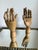 Vintage articulated wooden artist mannequin hand featuring fully jointed fingers, thumb, and knuckle segments designed for...