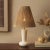 Introducing the Andez Table Lamp, a chic addition to your home decor. This lamp features a striking white marble base that...