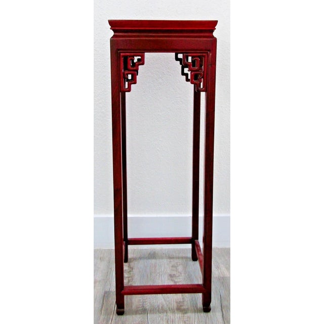 The Asian Solid Rosewood 36" High Square Plant Stand Pedestal is a large, vintage-inspired piece of indoor décor made of...