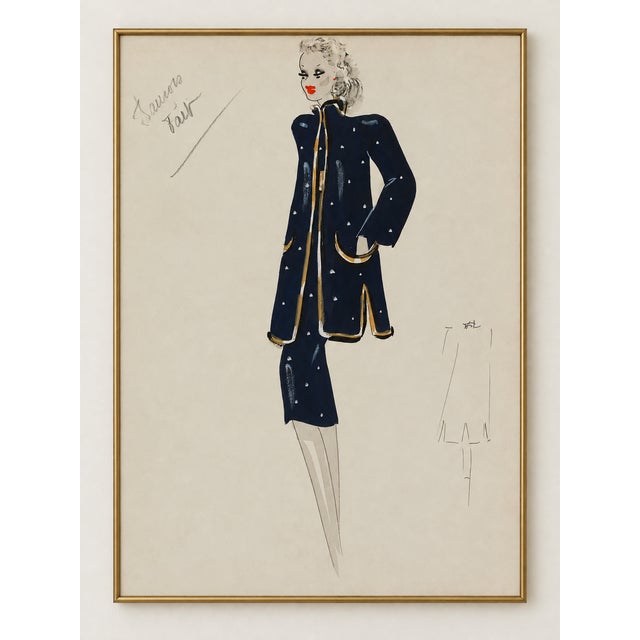 This vintage French fashion art print features an Art Deco woman in a navy polka-dot ensemble with gold trim. Made to...