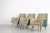 This set of three armchairs was made in the 1950s, the design is attributed to Melchiorre Bega. The two-tone armchairs...