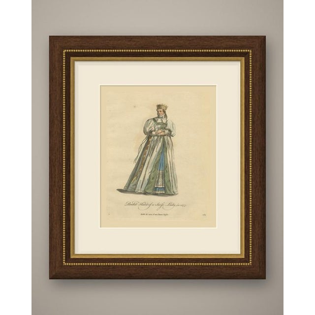 This is an original antique copper engraving with hand coloring, lettered in script "bridal habit of a swiss lady, in...