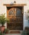 Antique Brass-Clad Carved Entry Doors | Monumental Farmhouse Statement Doors 118x92 For Sale In Orlando - Image 6 of 6