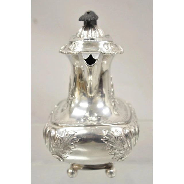 Antique English Victorian Silver Plated Floral Repousse Coffee Pot Teapot. Circa Early 20th Century. Measurements: 8.5" H...